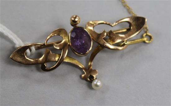 An Edwardian Art Nouveau 9ct gold amethyst and seed pearl brooch